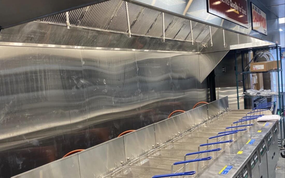 Custom stainless kitchen hood fabricated by Airtech
